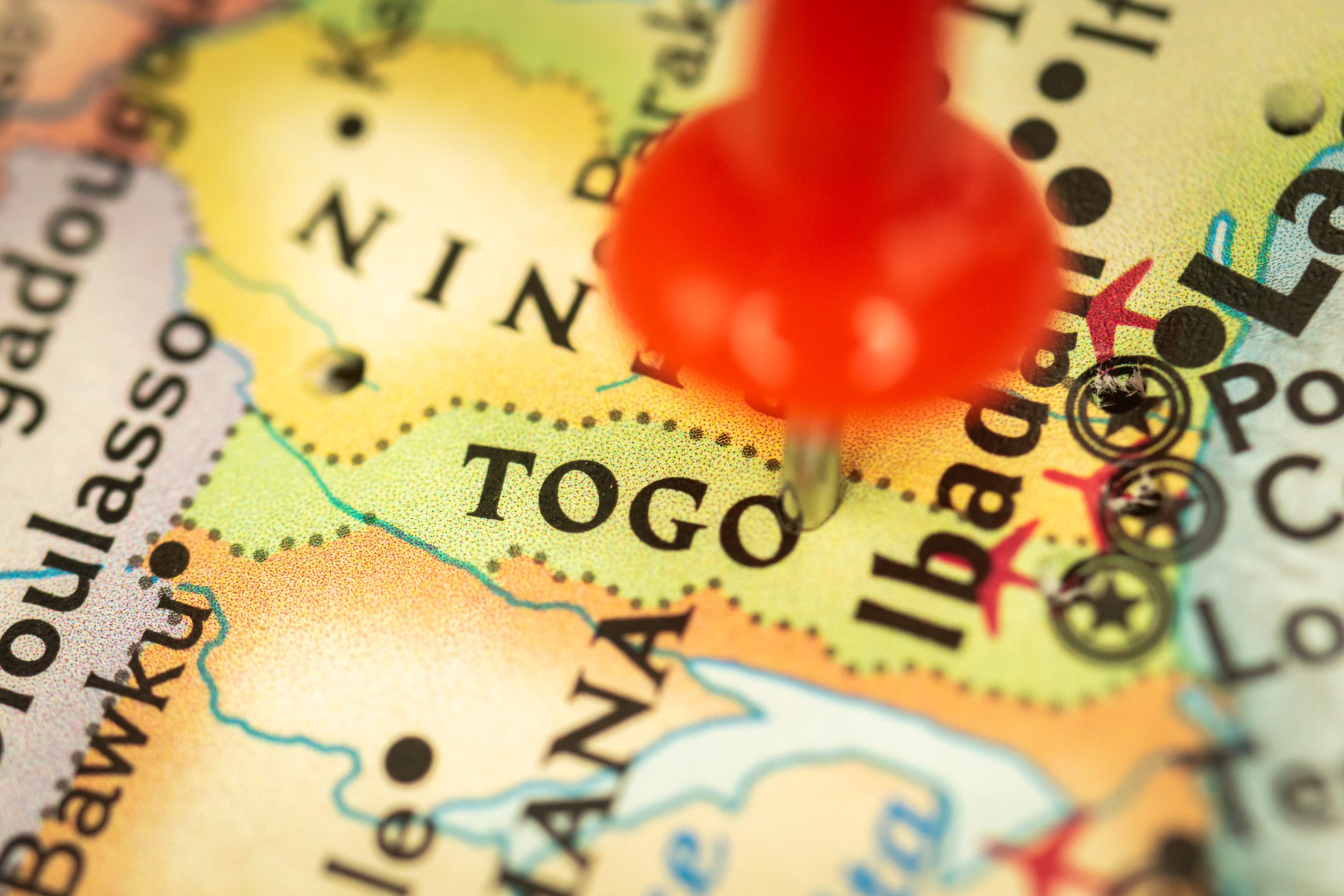 A Red Pin Marks Togo On The Map