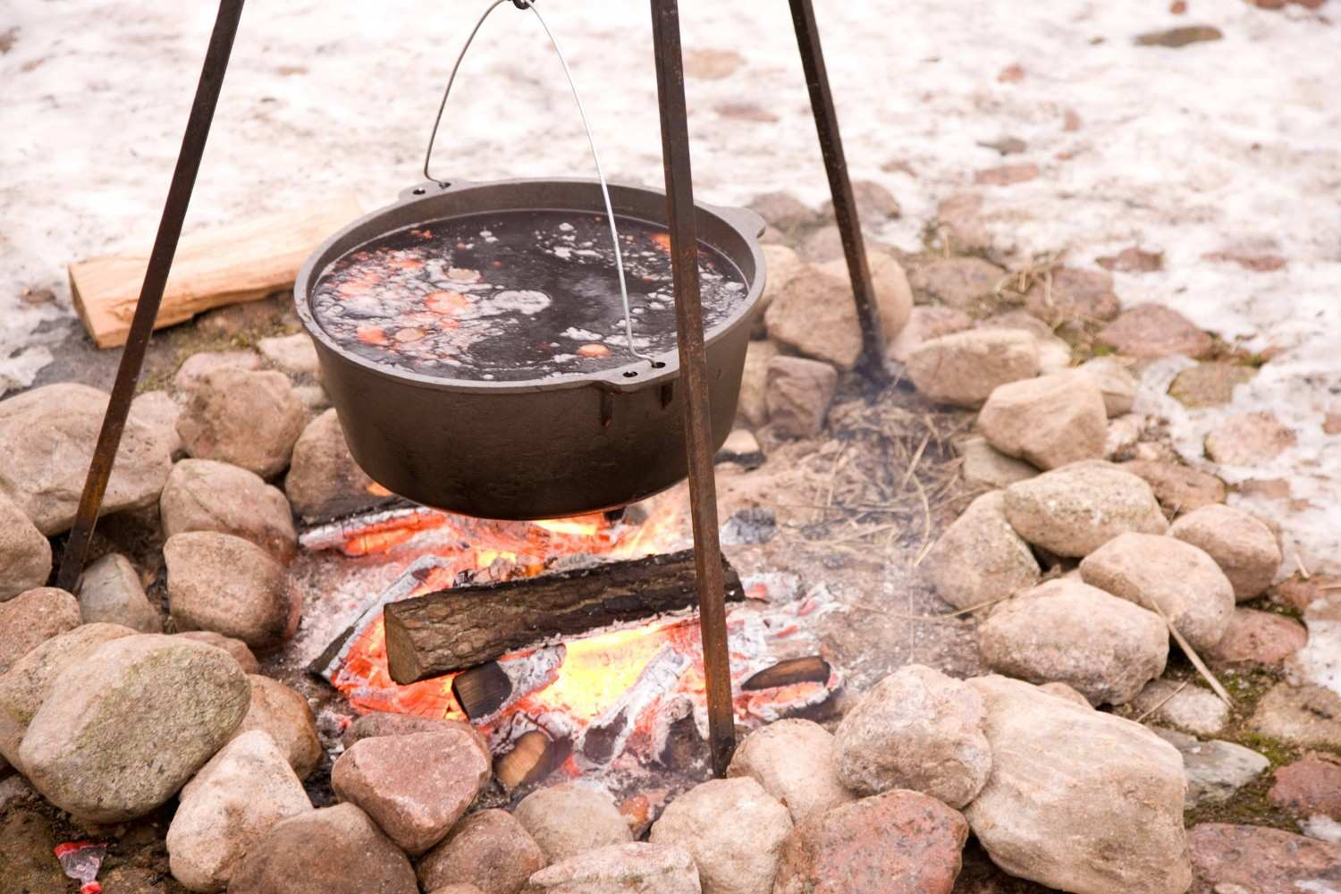 Cooking Pot Over A Campfire With Stones