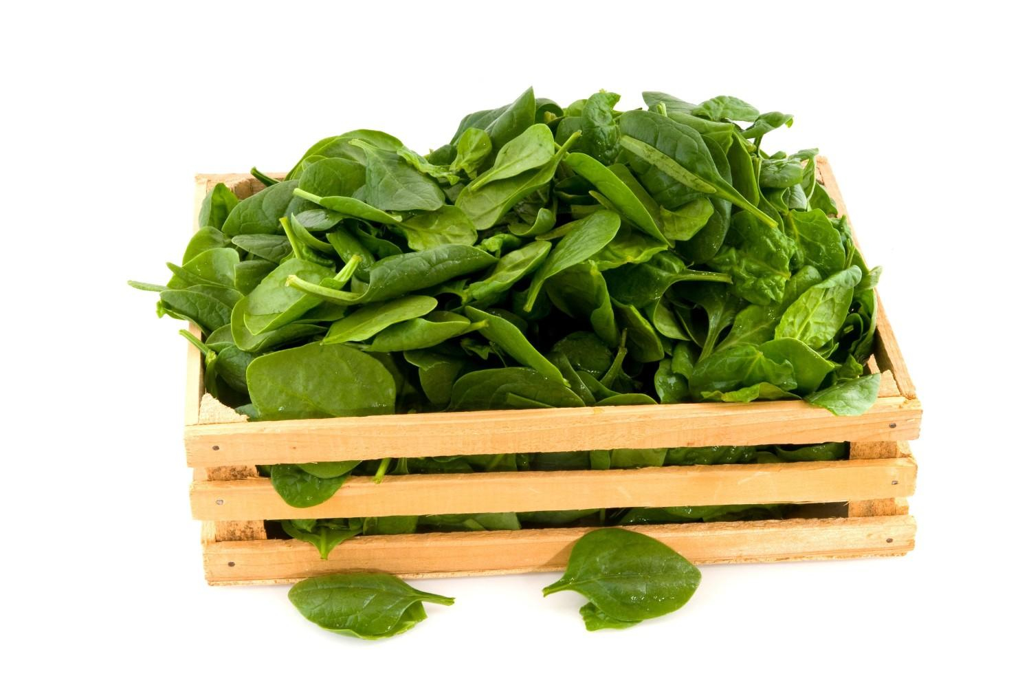Fresh Spinach Leaves In A Wooden Crate